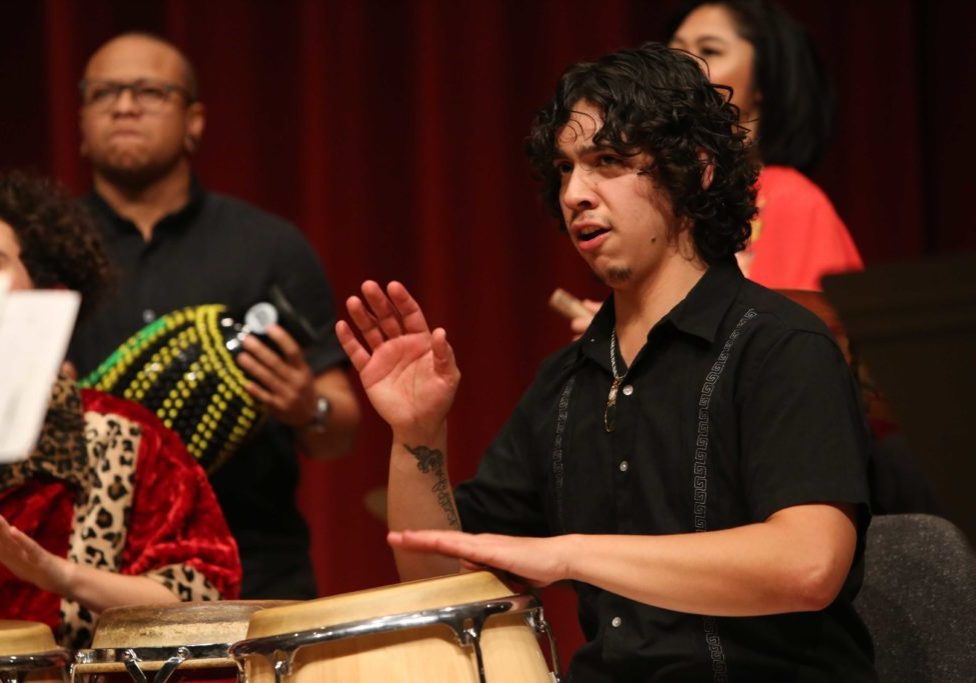 Ahkeel Mestayer-Velasquez plays the drums during the Afro-Cuban Jazz Ensemble Concert at SFSU’s Knuth Hall on Wednesday, December 5th, 2018. (Mira Laing/Golden Gate Xpress)